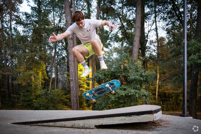 Skaters practice their tricks at Kamiersky Skate Park in Conroe.
