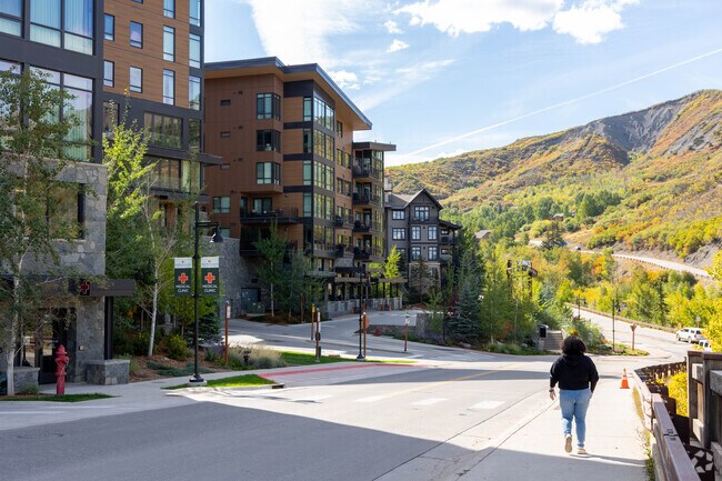 Contemporary condos line Snowmass streets with Aspen Valley Health steps away.