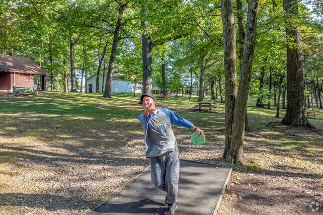 Highland Park, situated on top of a hill, has a playground and a disc golf course.