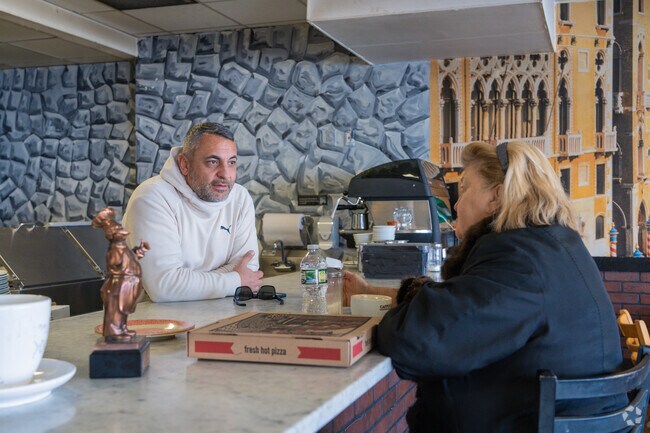 Totowa's Wood Burning Oven and Pizza serves warm pizza with warm customer service.