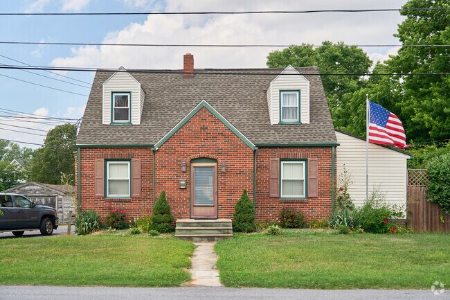Charming Cape Cod style homes line the streets in Halfway.