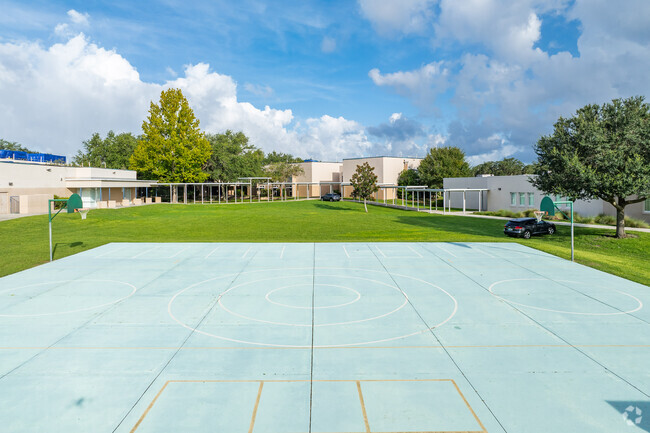 Students enjoy outdoor play on the sports courts at Valrico Elementary.