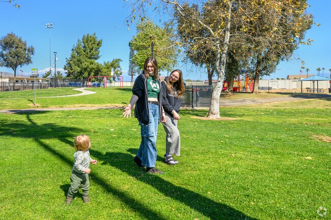 Stroll through the wide grassy fields of Moreno Valley Community Park near Creekside.