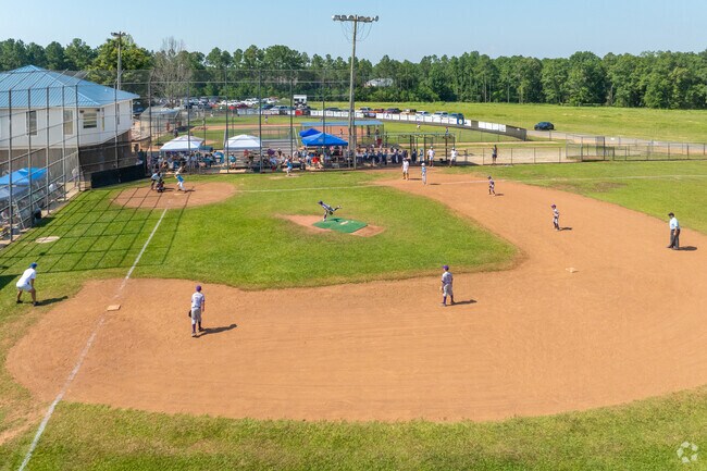 Saturdays in the summer bring out youth baseball teams to the Semmes Community Park.