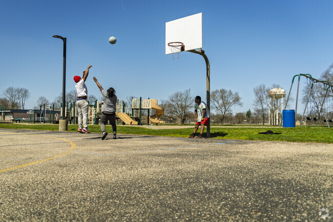 South Benham kids shoot hoops on the weekend at Concord West Side Elementary School