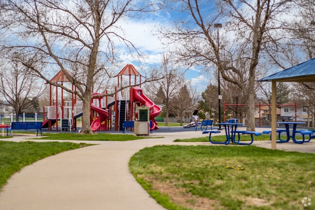 The Sherwood Park playground and pavilions is a popular spot for families in the Westcliff and Cambridge neighborhood in Westminster, Colorado.