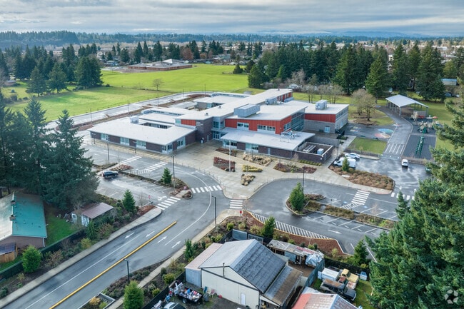Nestle amongst fir trees, Ogden Elementary School in Vancouver, WA.