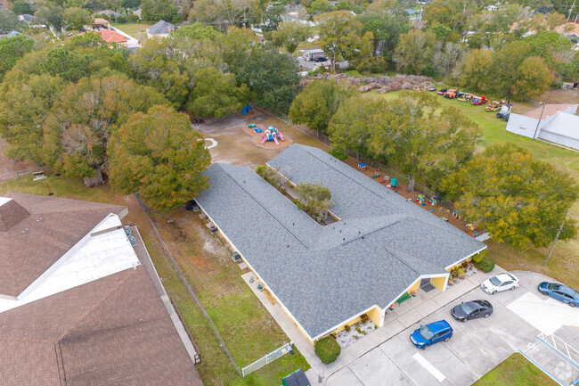 Kiddie Academy of Carrollwood features a play area in the back yard.
