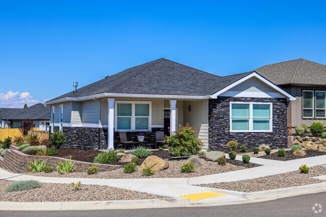 Newly constructed craftsman-style homes line the streets of Greenhills Estates.