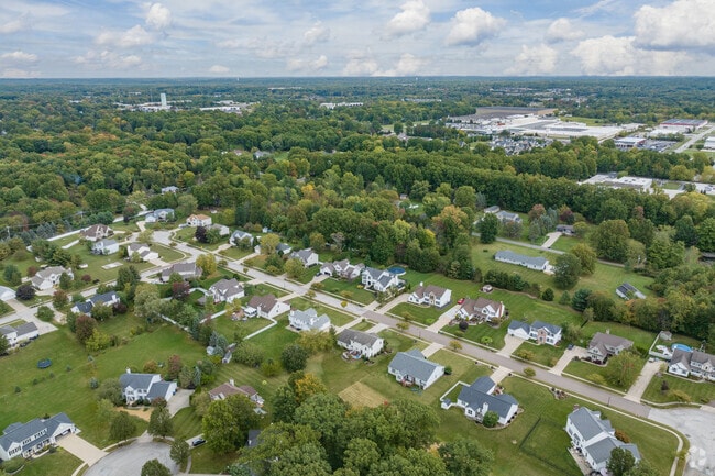 Aerial view of Cuyahoga Falls  neighborhood with a wide range of home styles.