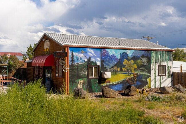 A mural decorates the side of The Whimsical Wagon in Silt.