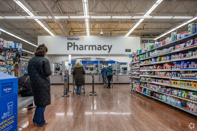 The Walmart near Alimagnet has a pharmacy.