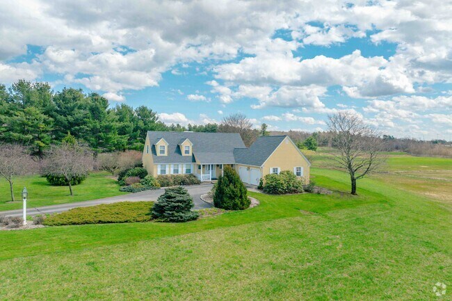 Ranch homes in West Boylston sit along peaceful, tree-lined roads.