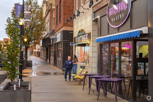 Locals often hang out by storefronts like Springfield Vintage in Downtown Springfield.