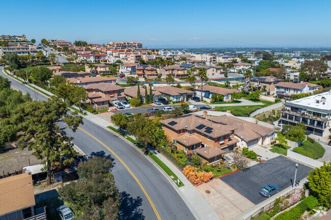Spanish style and modern villas up towards the top of Signal Hil.