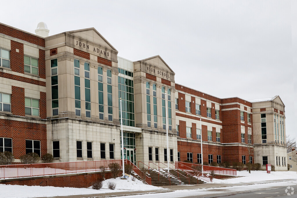 John Adams High School's brick building, is a sturdy icon of learning, welcoming generations.