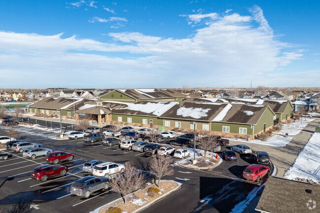 The parking area and entrance at Foundations Academy in Brighton, Colorado.