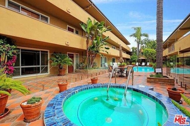 Warm up on cool nights with friends in hot tub with 24 soothing jets