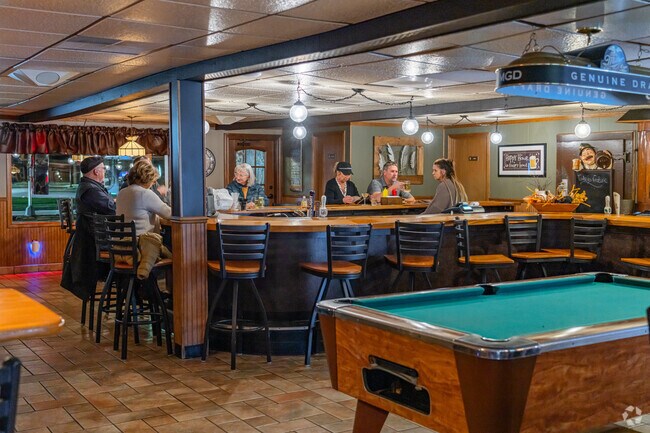 Residents are able to unwind with friends at Switched II after a day in the village.