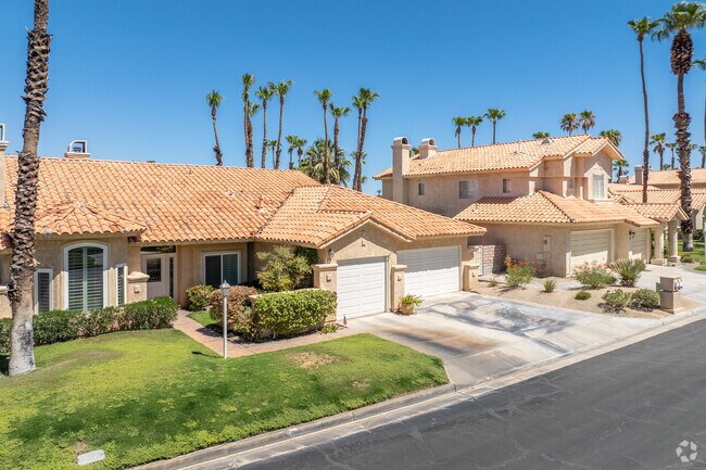 The streets are wide and each home has a 2-3 car garage with mature trees and a front yard.
