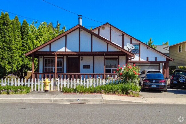 This lovely home features Tudor styling that is unique in South Auburn.