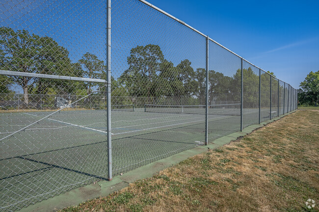 Gated tennis courts at Five Oaks Middle School in Beaverton, Oregon.