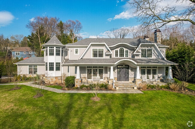 Many homes in Plandome Manor have large front porches.