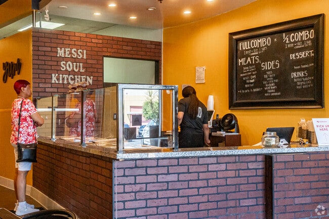 Locals enjoy homestyle cooking at Messi Soul Kitchen in La Sierra.