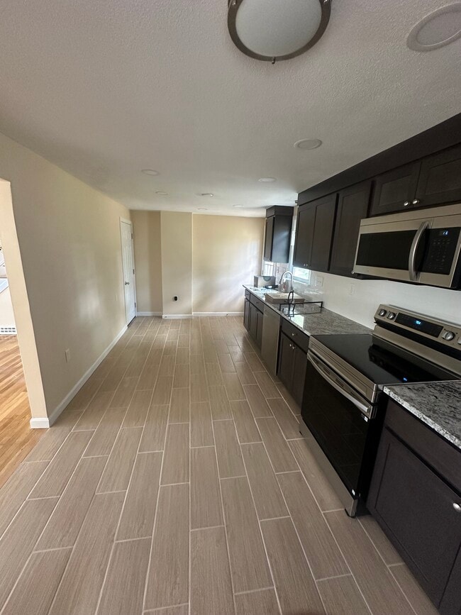 341 Stevens St, Lowell, MA 01851 - photo 4