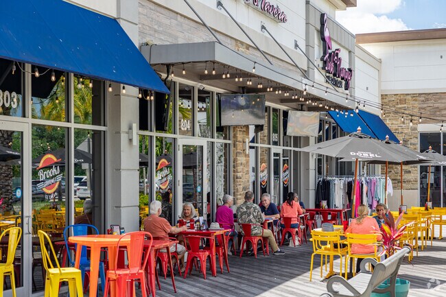 Logan Landings offers patio dining at retail shops near Riverstone.