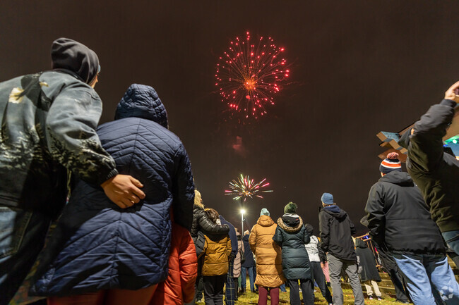 The Sunnyside community watches the Munster fireworks at the New Year's Eve Fireworks.