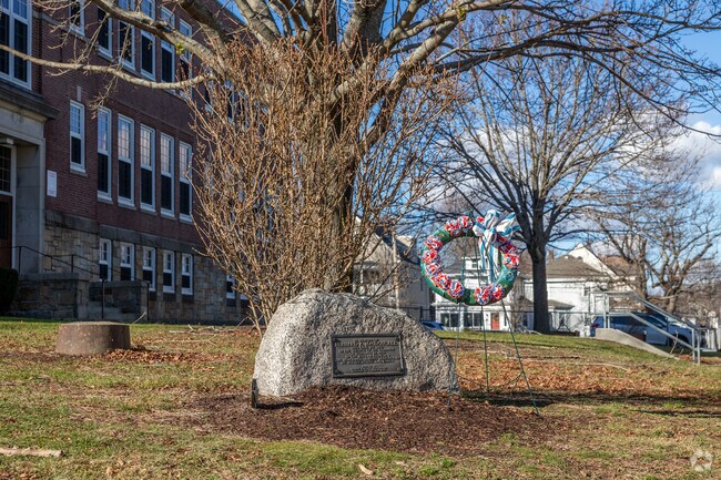 A memorial plaque stands in front ofFrancis W. Parker Elementary School in Quincy.