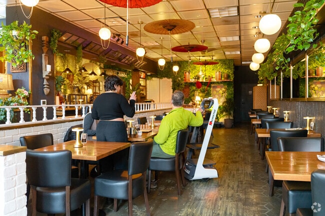 Burmese dishes served by cute robots at Top Burmese Burma Joy in Uptown Portland.