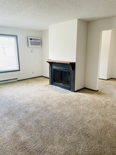 1 Bdrm with Den & Fireplace