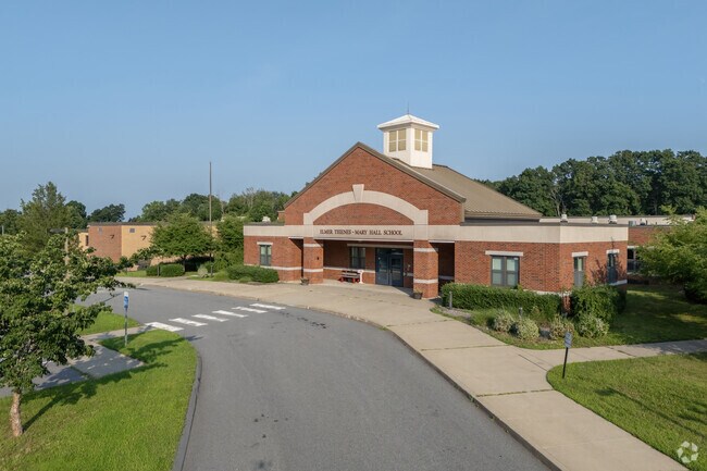 The Elmer Thienes-Mary Hall Elementary School has a traditional cupola and a modern entry.