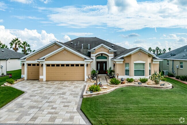 Large designer homes line the streets of the Village of Largo.