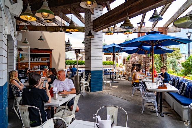 Patio dining is a popular pastime at Bartaco in North Hills Mall Shopping Center.