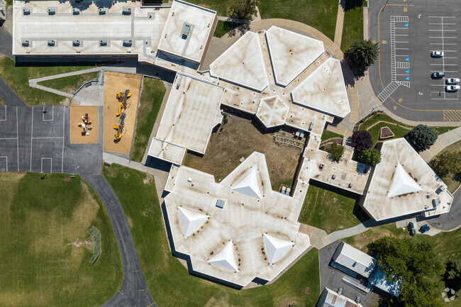 White geometric shapes make interesting patterns on the rooftops at Bates Elementary School.