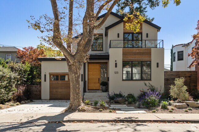 Modern design shines in this Baywood-Aragon home, blending sleek design with natural tones.