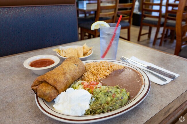 Mr. Pancho serves up a delicious chimichanga for lunch in the Fraser Fields neighborhood.