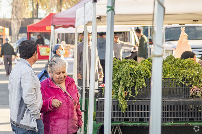 Always a smile and bargain at Orange County Farmers' Markets.