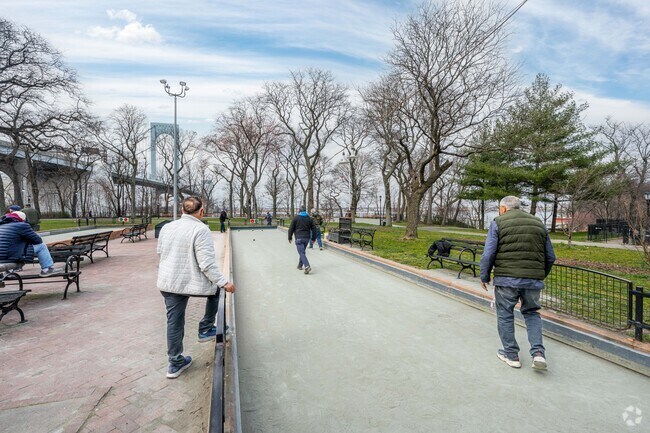 Elderly people play bocce ball at Francis Lewis Park in Whitestone.