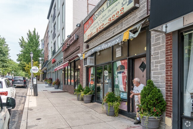 An Upper Roxborough resident takes time out to smoke his pipe along Ridge Ave.