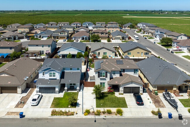New homes are situated against productive farmland in Keyes.