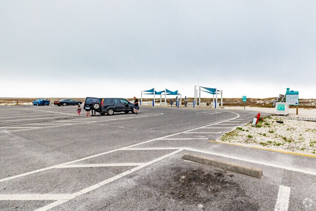 People are drawn to the Navarre Beach Community Maritime Park even on a cloudy day.