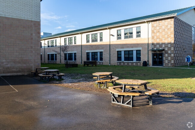 Davis Elementary School has tables outside so the kids and sit and talk to their friends.