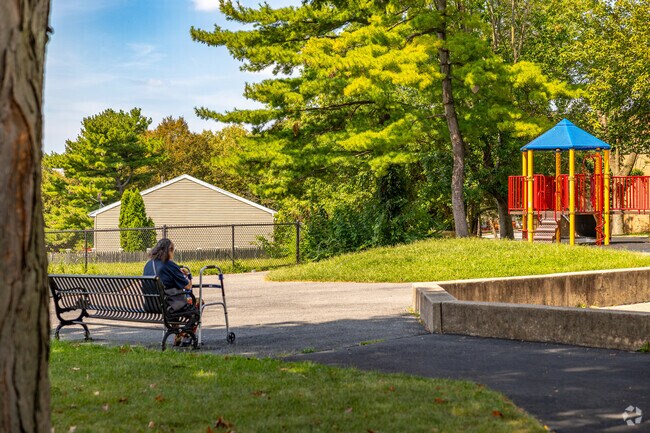 Sit on the bench while you watch the kids play at Barbey's Playground near Center-City Berks.