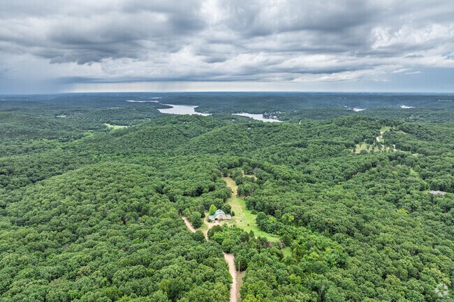 Roach is a wooded and sparsely populated area with access to Lake of the Ozarks.