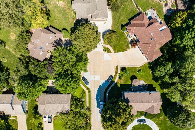 Tree-lined cul-de-sacs adorn the Northwest Omaha neighborhood.