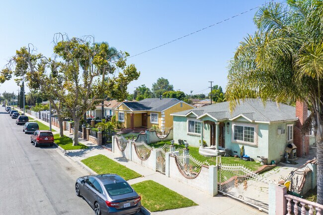 Residential streets in East Compton are lined with 1950s bungalows with stucco siding.